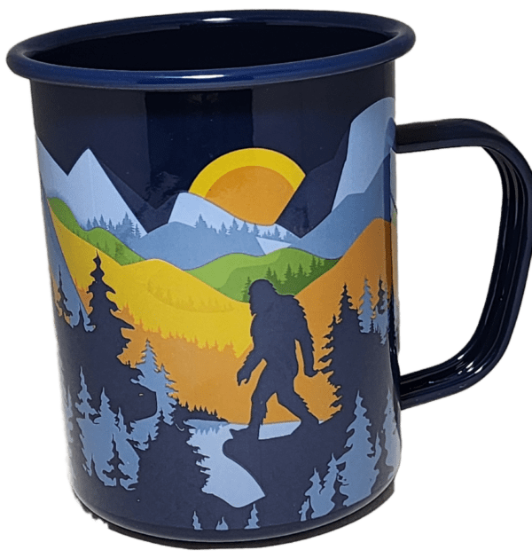 A blue mug with a picture of a bigfoot in the background.