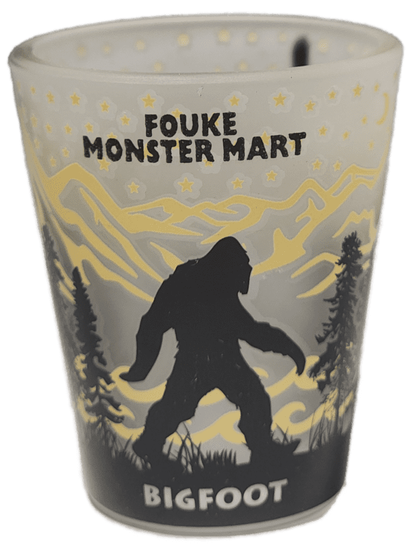 A cup with a picture of bigfoot on it.