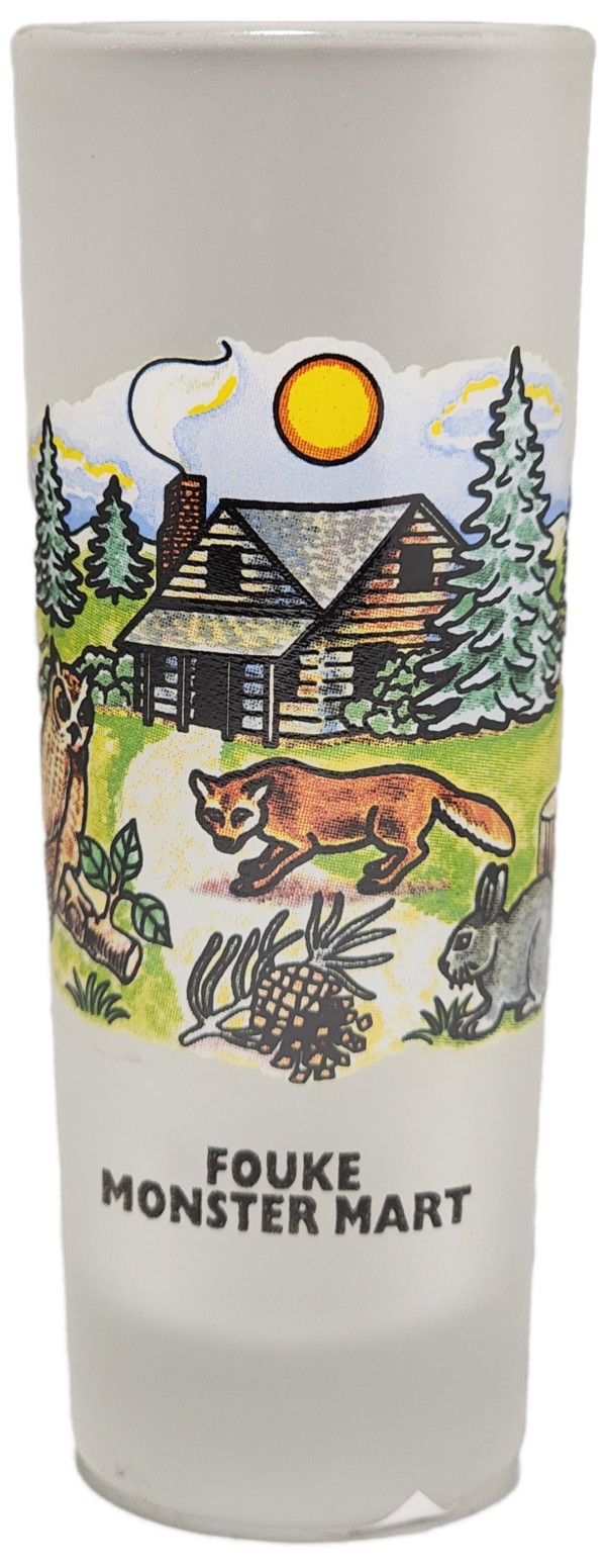 A close up of a cup with animals on it