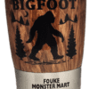 A close up of the side of a bigfoot mug