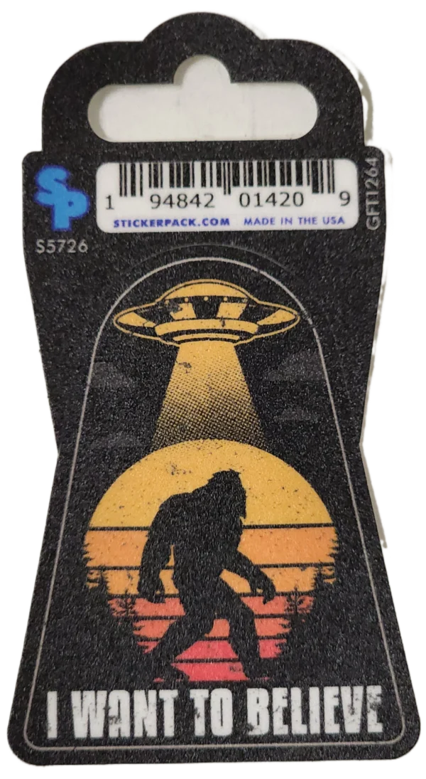 A sticker of a bigfoot and an ufo.