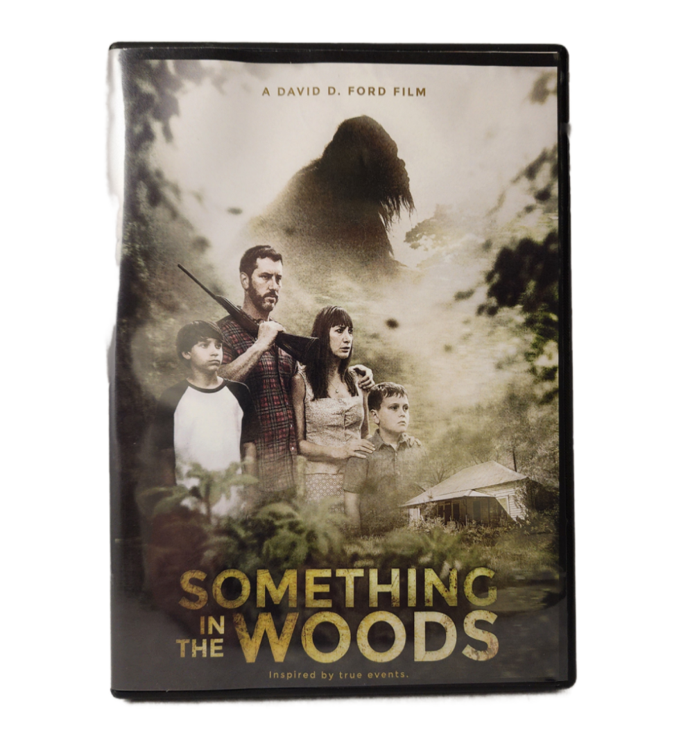 A dvd cover for something in the woods.