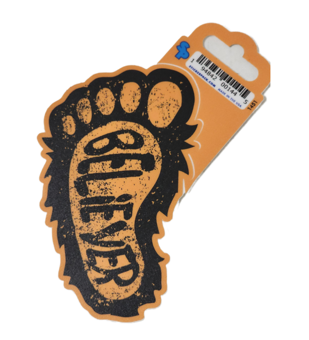 A sticker of a foot print with the word " believer " written on it.