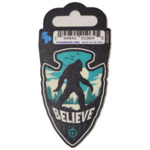 A sticker of a bigfoot with the word believe underneath it.