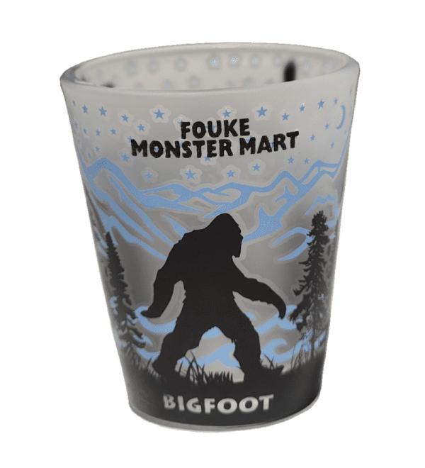 A cup with a picture of bigfoot on it.