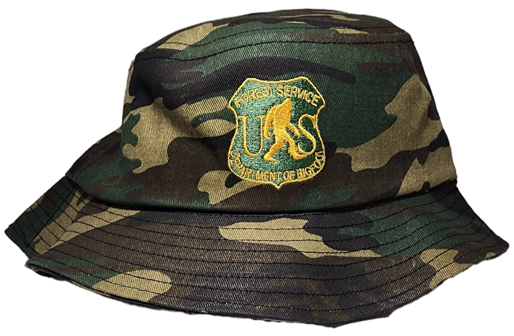 A camouflage hat with the u. S. Army emblem on it