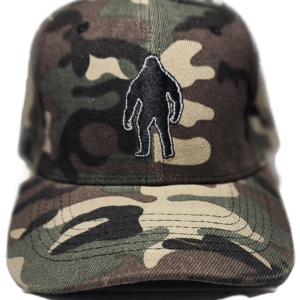 A baseball cap with a bigfoot patch on it.