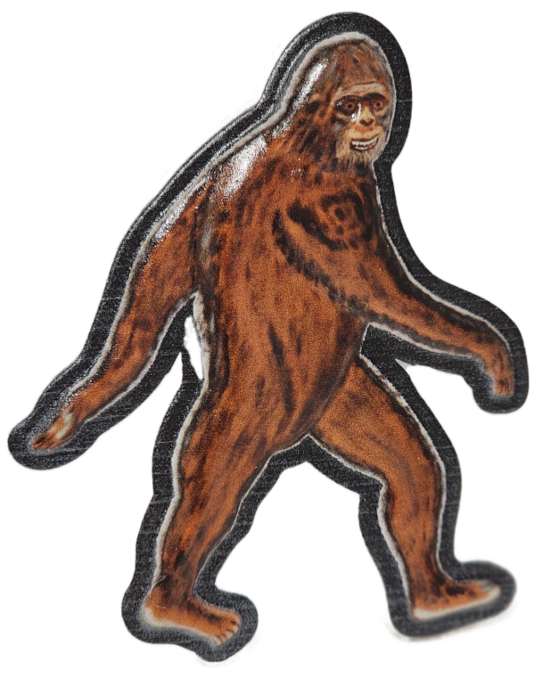 A drawing of a bigfoot on green background