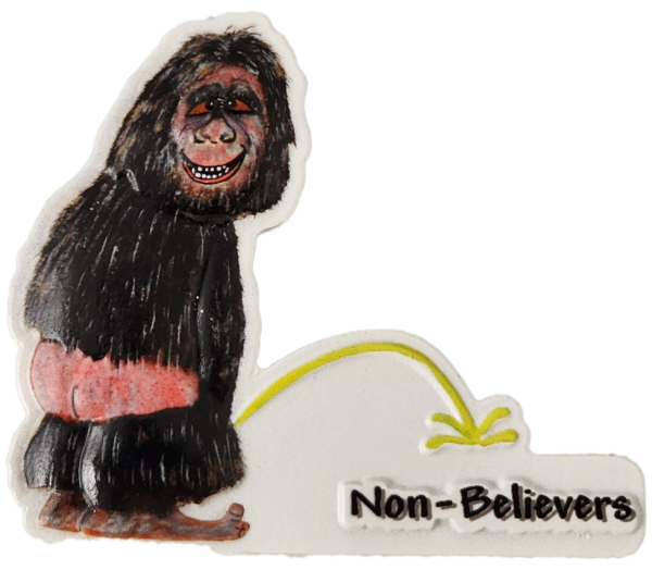 A gorilla is standing in front of the word non-believer.