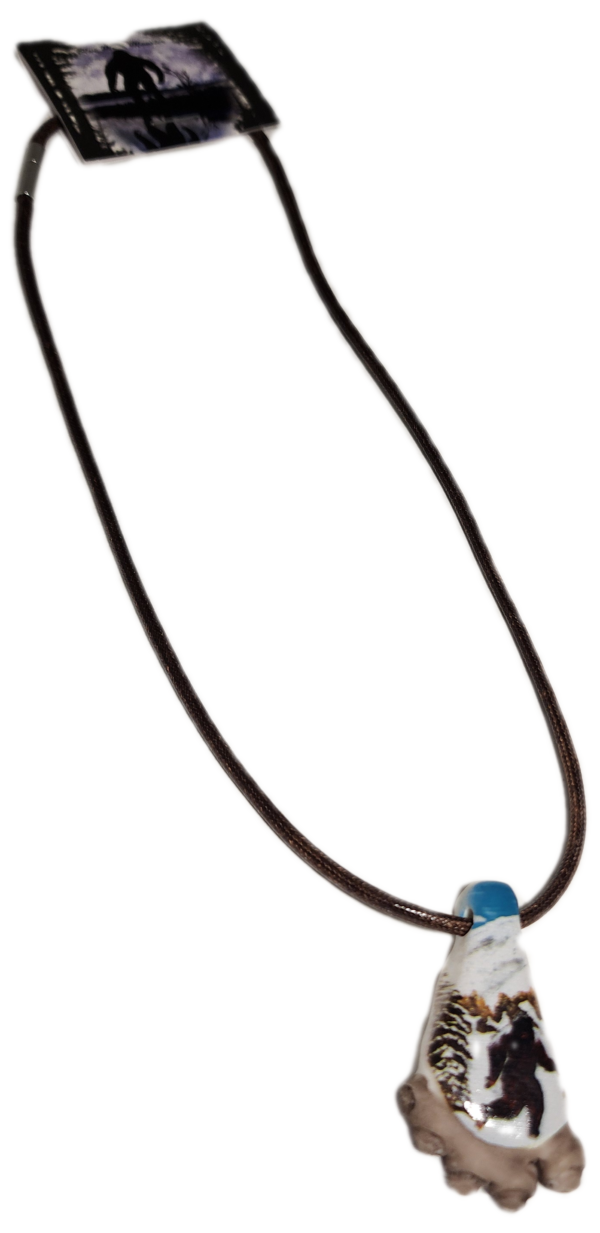 A necklace with a blue bead on it.