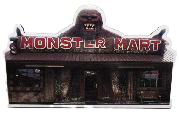 A monster market store front with a gorilla head on top.