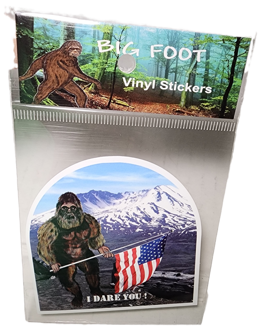 A sticker of an american flag and a bigfoot.