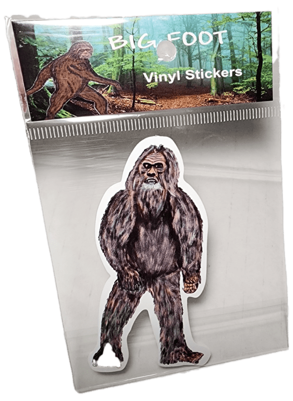 A sticker of a bigfoot standing in front of trees.