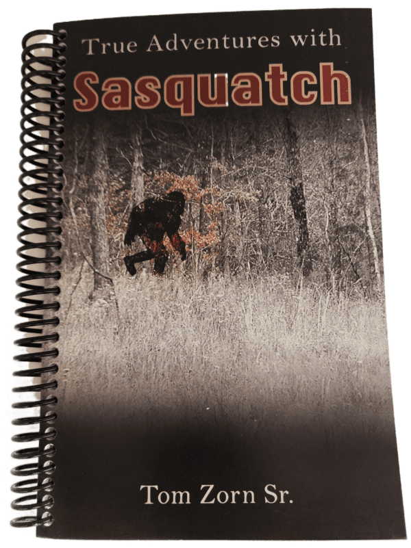 A spiral bound book with the cover of sasquatch.