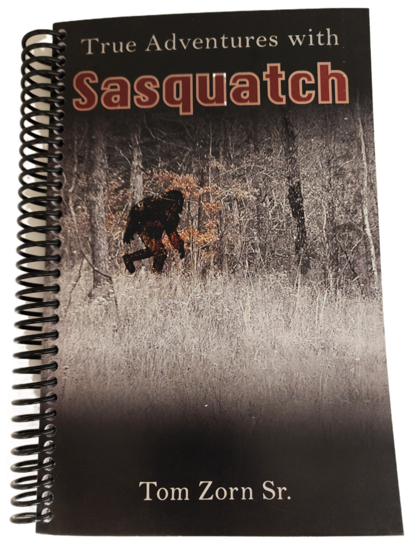 A spiral bound book with the cover of sasquatch.