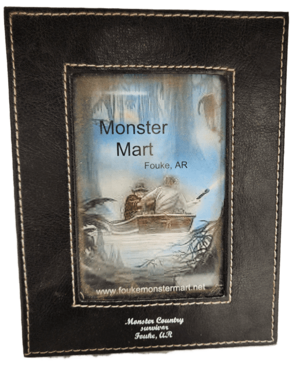 A picture frame with the words " monster mart " written on it.