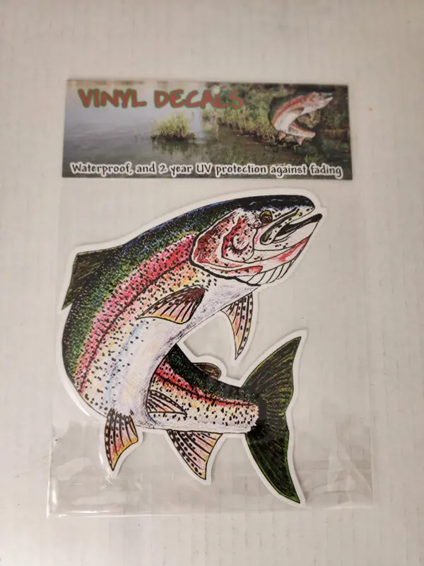 A sticker of two fish on the side of a boat.