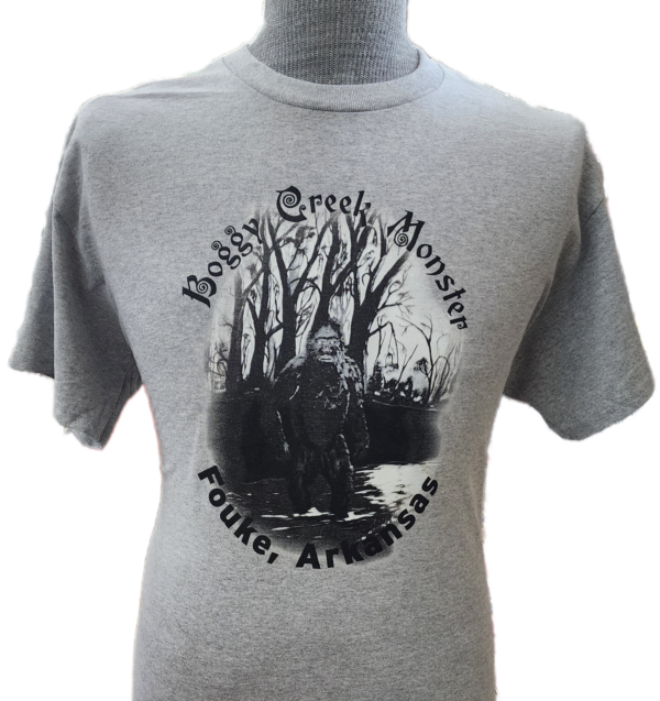 A t-shirt with an image of a man in the woods.