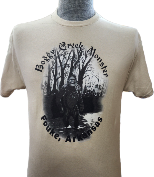 A t-shirt with a picture of a man in the woods.