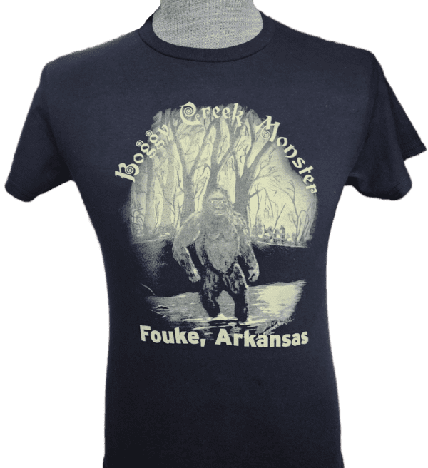 A t-shirt with an image of a man in the woods.