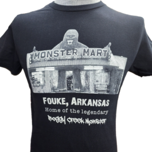 A black t-shirt with an image of the monster market.