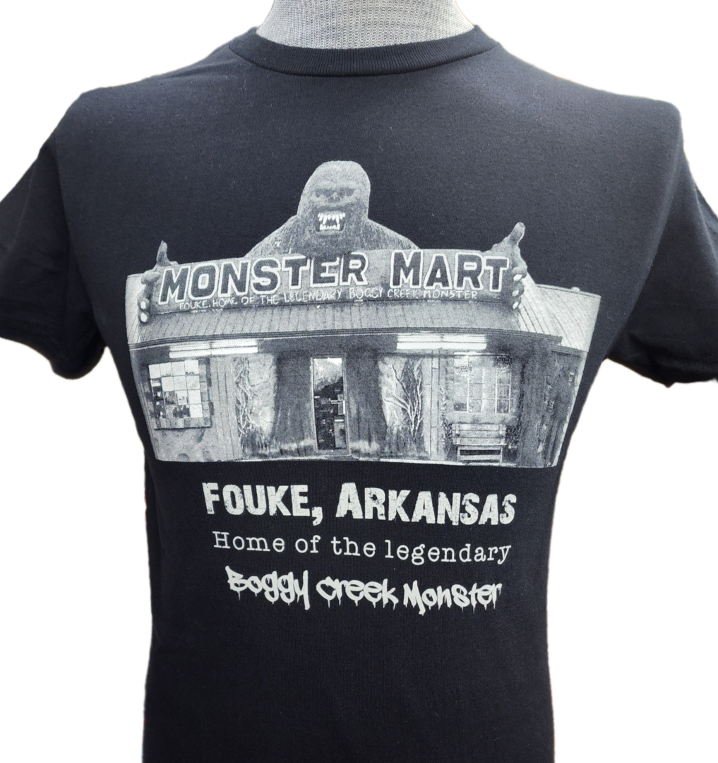 A black t-shirt with an image of the monster market.