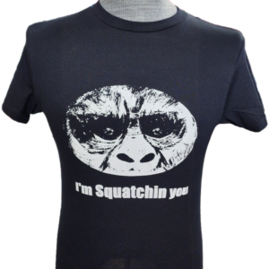 A t-shirt with an image of a gorilla wearing sunglasses.