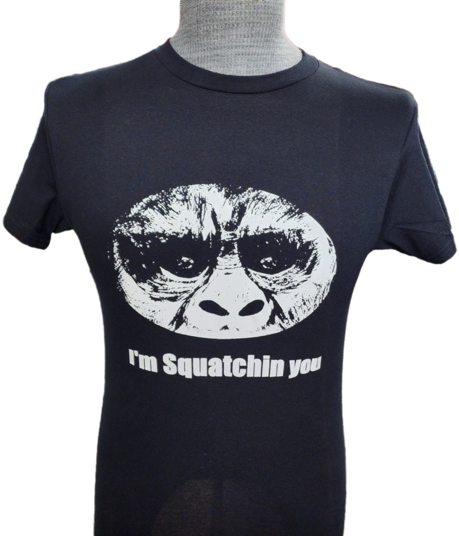 A t-shirt with an image of a gorilla wearing sunglasses.