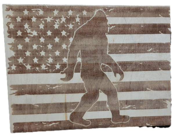 A picture of an american flag with a bigfoot on it.