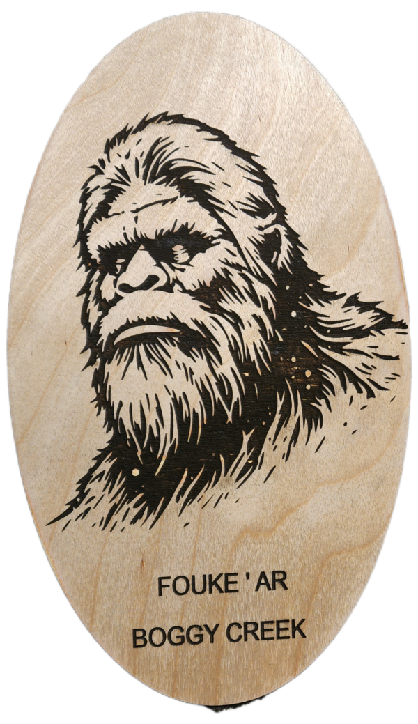 A drawing of a bigfoot on wood