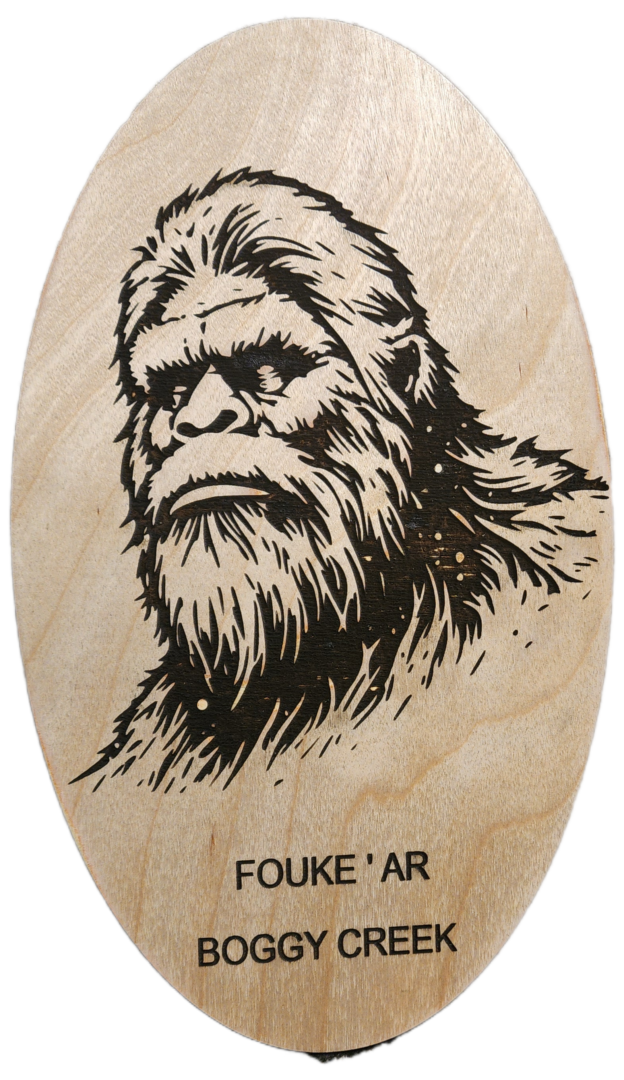 A drawing of a bigfoot on wood