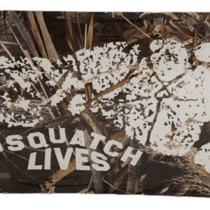 A picture of the back side of a wall with squatch lives written on it.