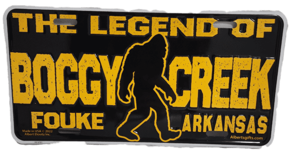 A black and yellow sign with an image of bigfoot.