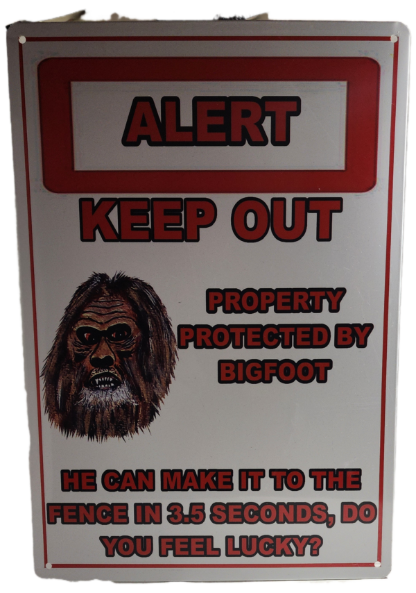 A sign with an image of a man 's face on it.