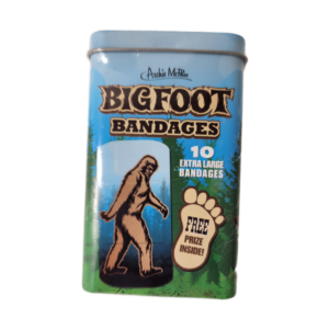 A tin of bigfoot bandages with an image of a person walking.