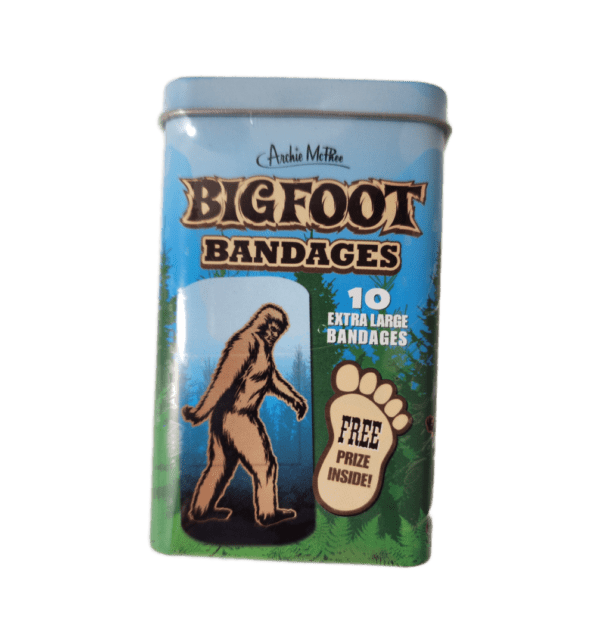 A tin of bigfoot bandages with an image of a person walking.