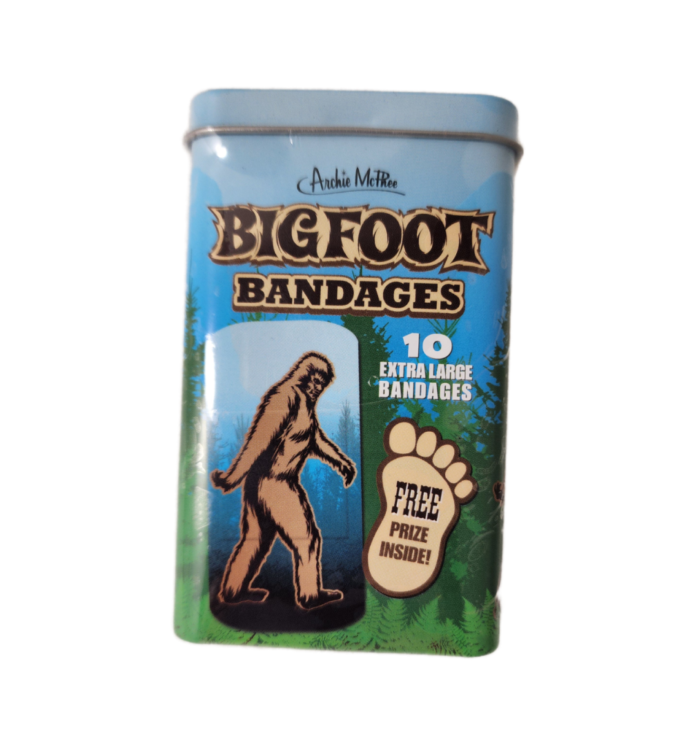 A tin of bigfoot bandages with an image of a person walking.