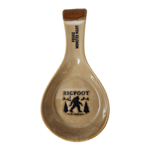 A spoon rest with bigfoot written on it.