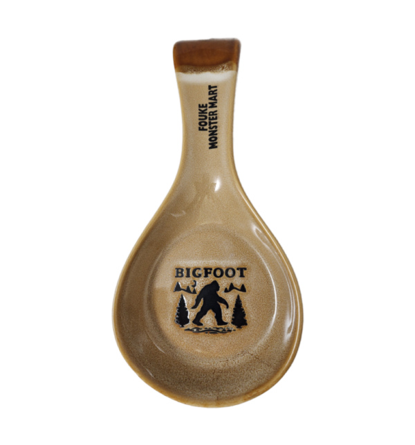 A spoon rest with bigfoot written on it.