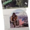 A picture of a bigfoot and an american flag.