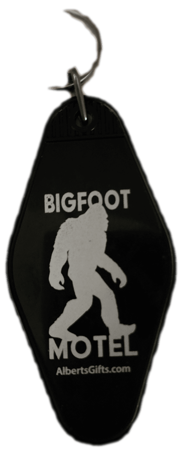 A black bag with a white bigfoot on it.