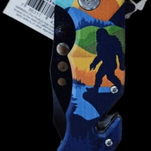 A knife with a picture of a bigfoot on it.